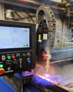 AC Servo Drives LC-1 CNC Retrofit operator console featuring Hypertherm Edge Connect 15-inch touch screen for HVAC plasma cutting.